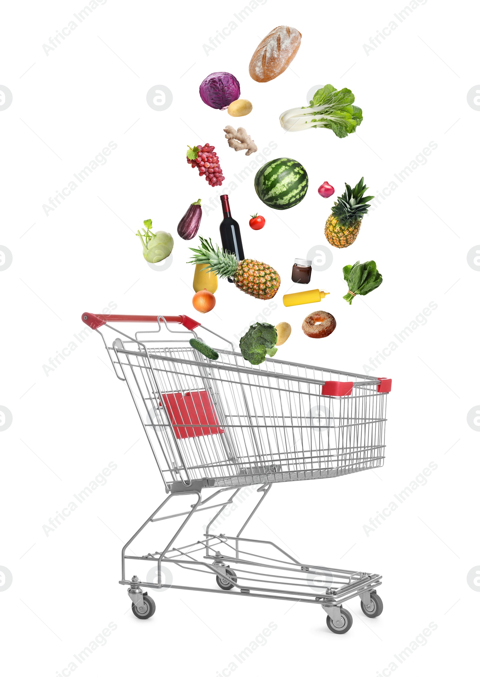 Image of Market assortment. Different products falling into shopping cart on white background