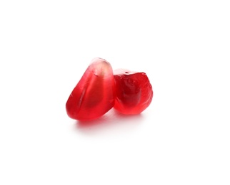 Photo of Pomegranate seeds on white background. Delicious fruit