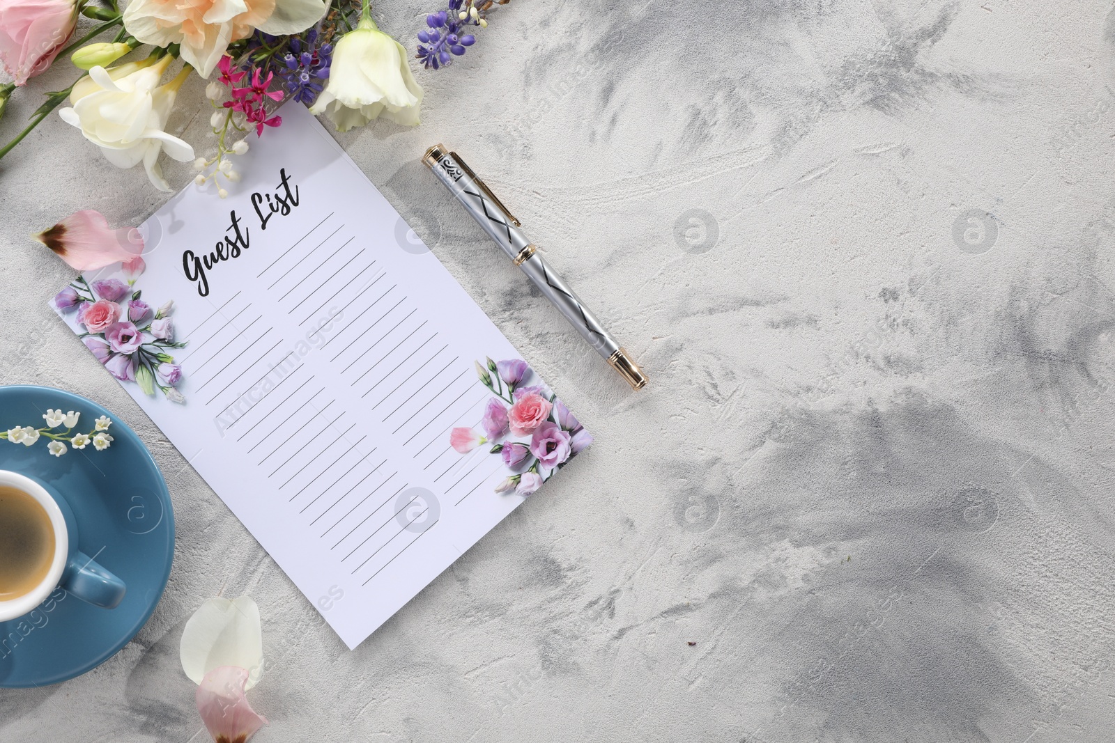 Photo of Guest list, coffee, pen and beautiful flowers on light textured table, flat lay. Space for text