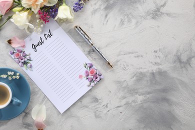Guest list, coffee, pen and beautiful flowers on light textured table, flat lay. Space for text