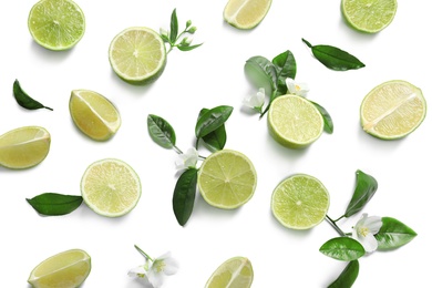 Composition with fresh ripe limes on white background, top view