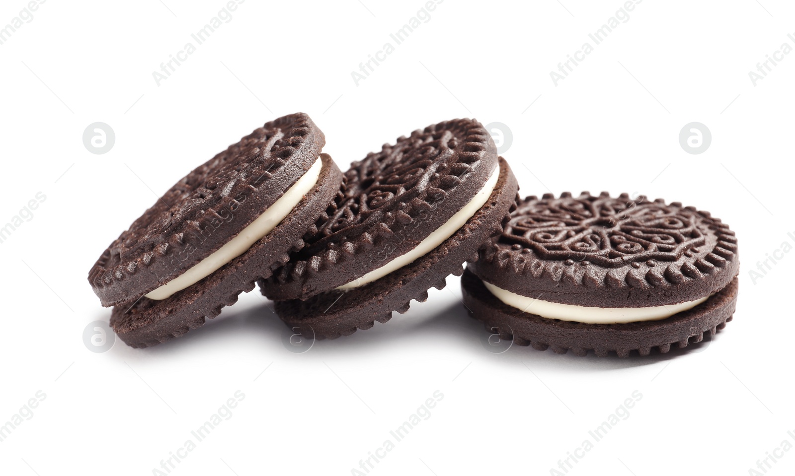 Photo of Tasty chocolate cookies with cream on white background