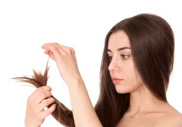 Woman with damaged hair on white background. Split ends