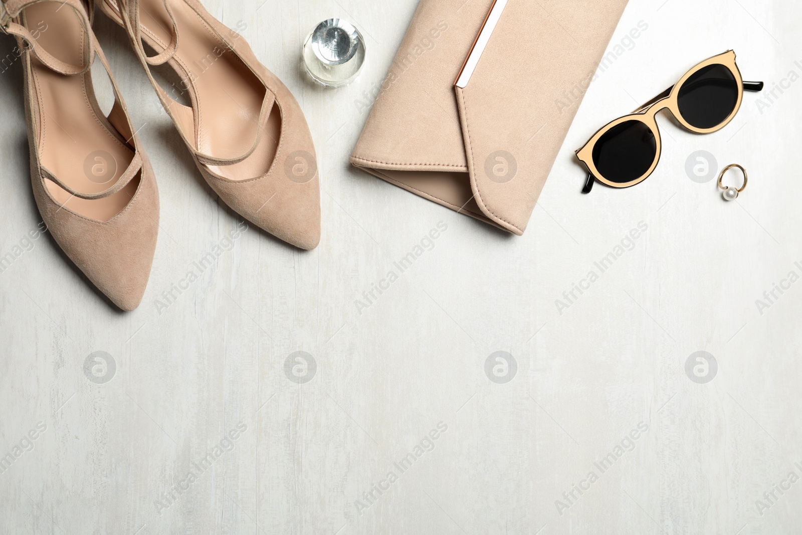 Photo of Flat lay composition with beautiful shoes on white background, space for text