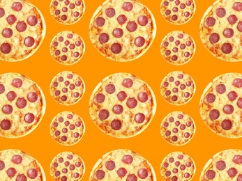 Pepperoni pizza pattern design on orange background 