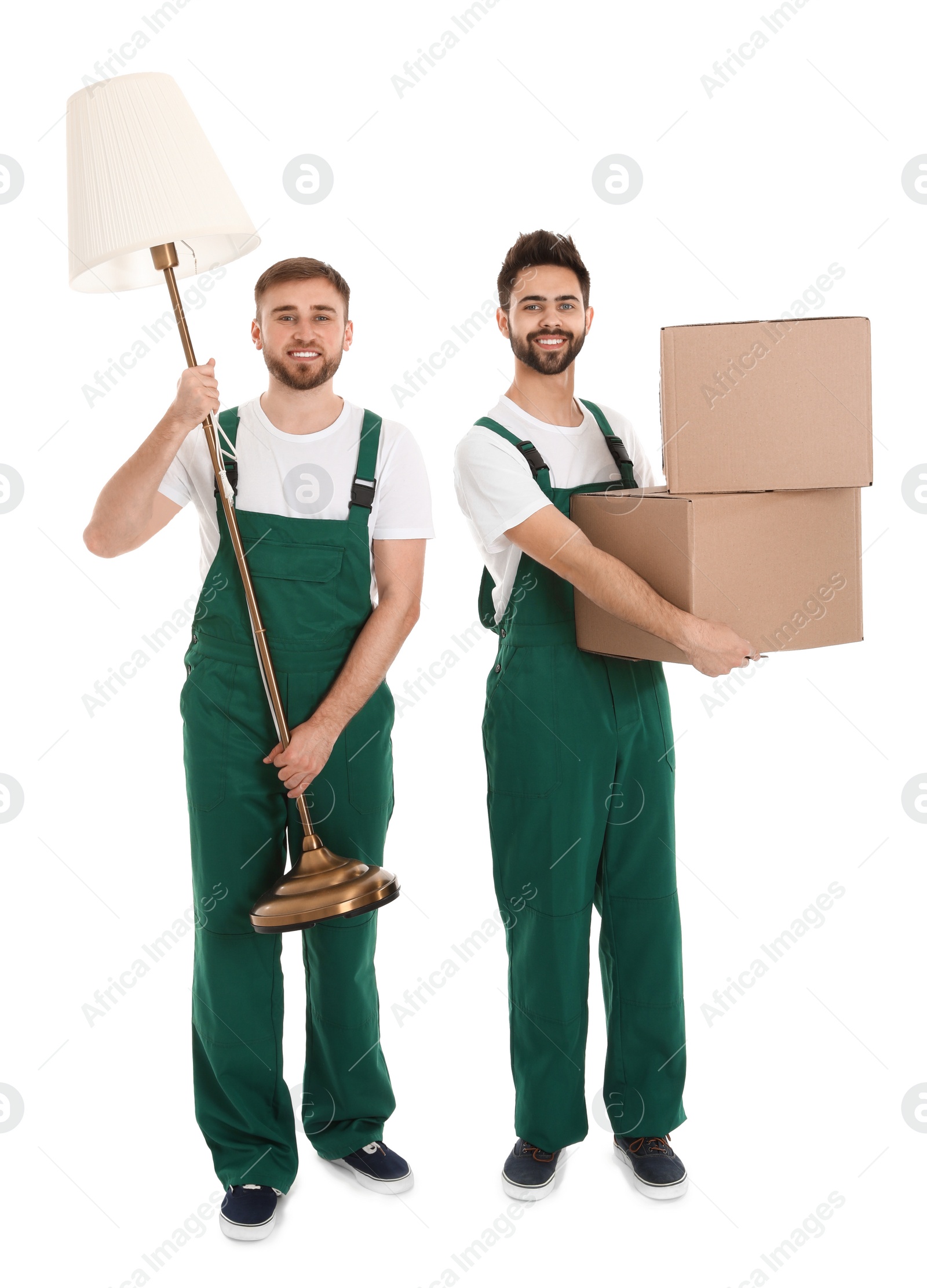 Photo of Young workers carrying stuff isolated on white. Moving service