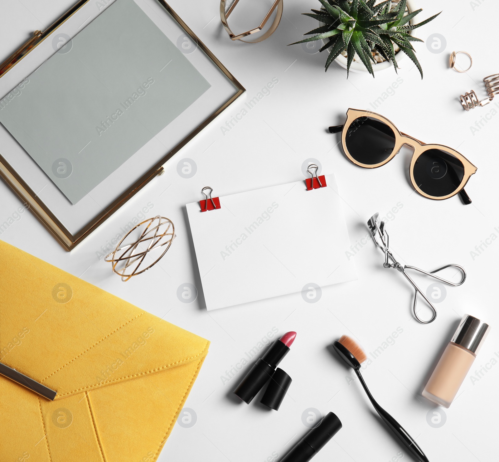 Photo of Flat lay composition with female accessories and blank card on white background. Beauty blogger