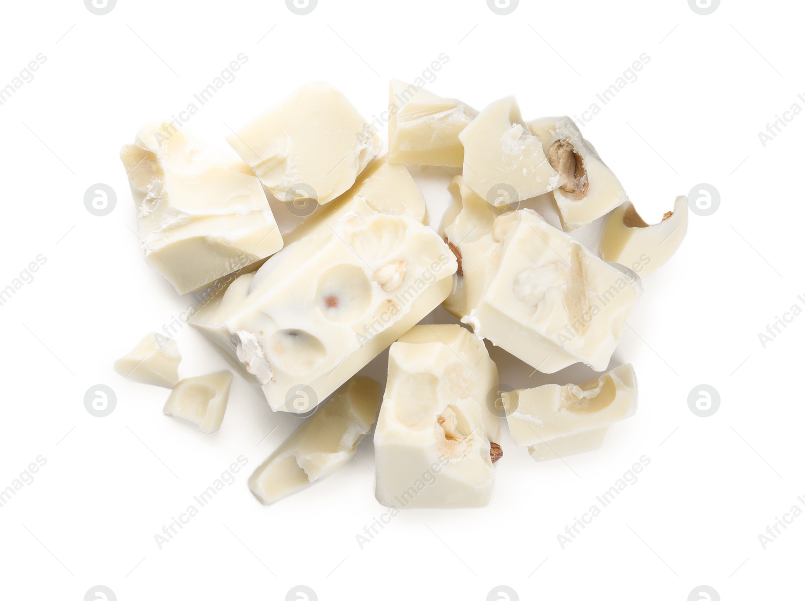 Photo of Pieces of delicious chocolate with nuts isolated on white, top view