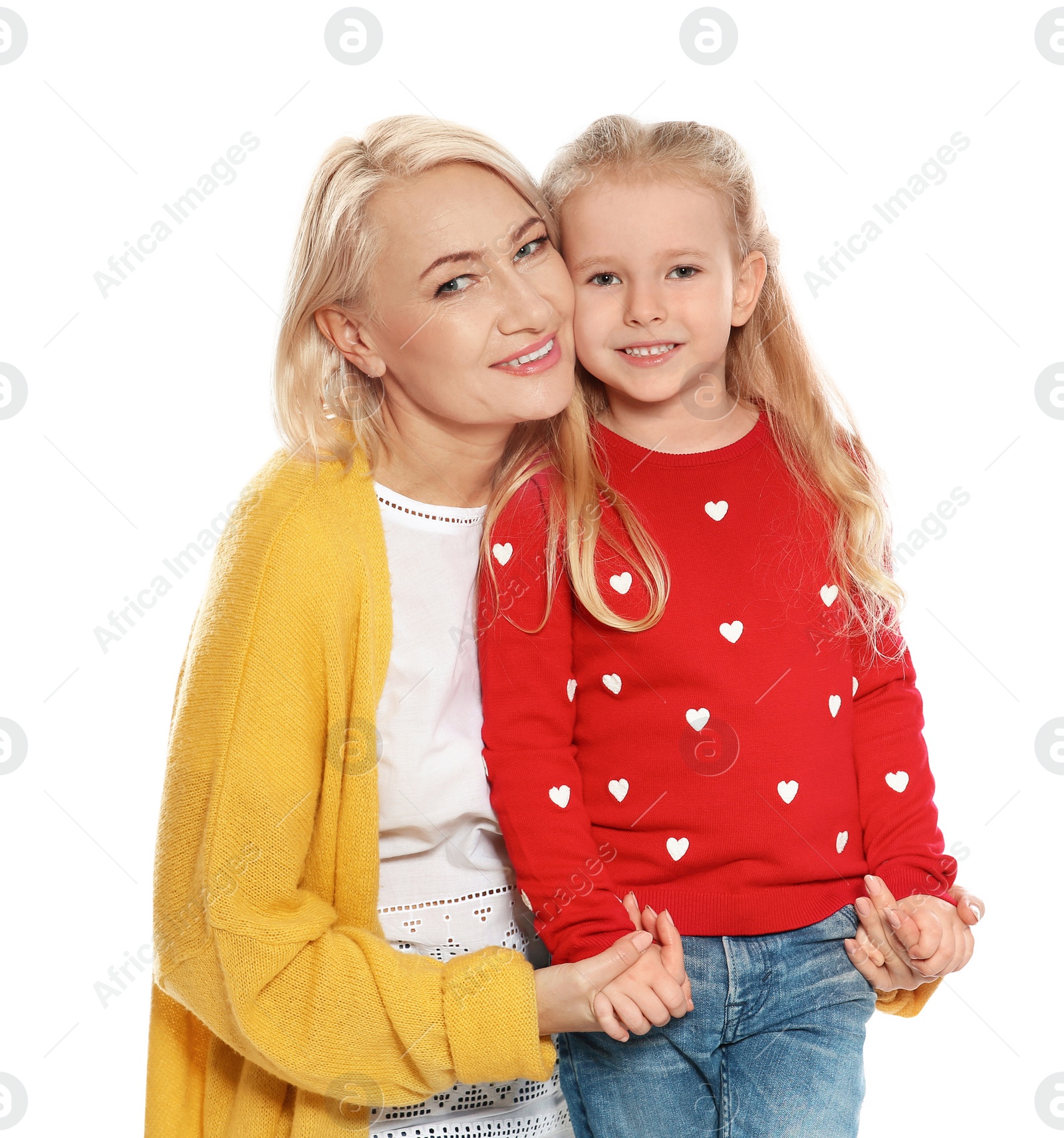 Photo of Portrait of mature woman and her granddaughter isolated on white