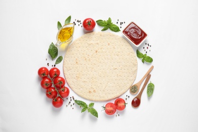 Photo of Flat lay composition with fresh ingredients for pizza on white background