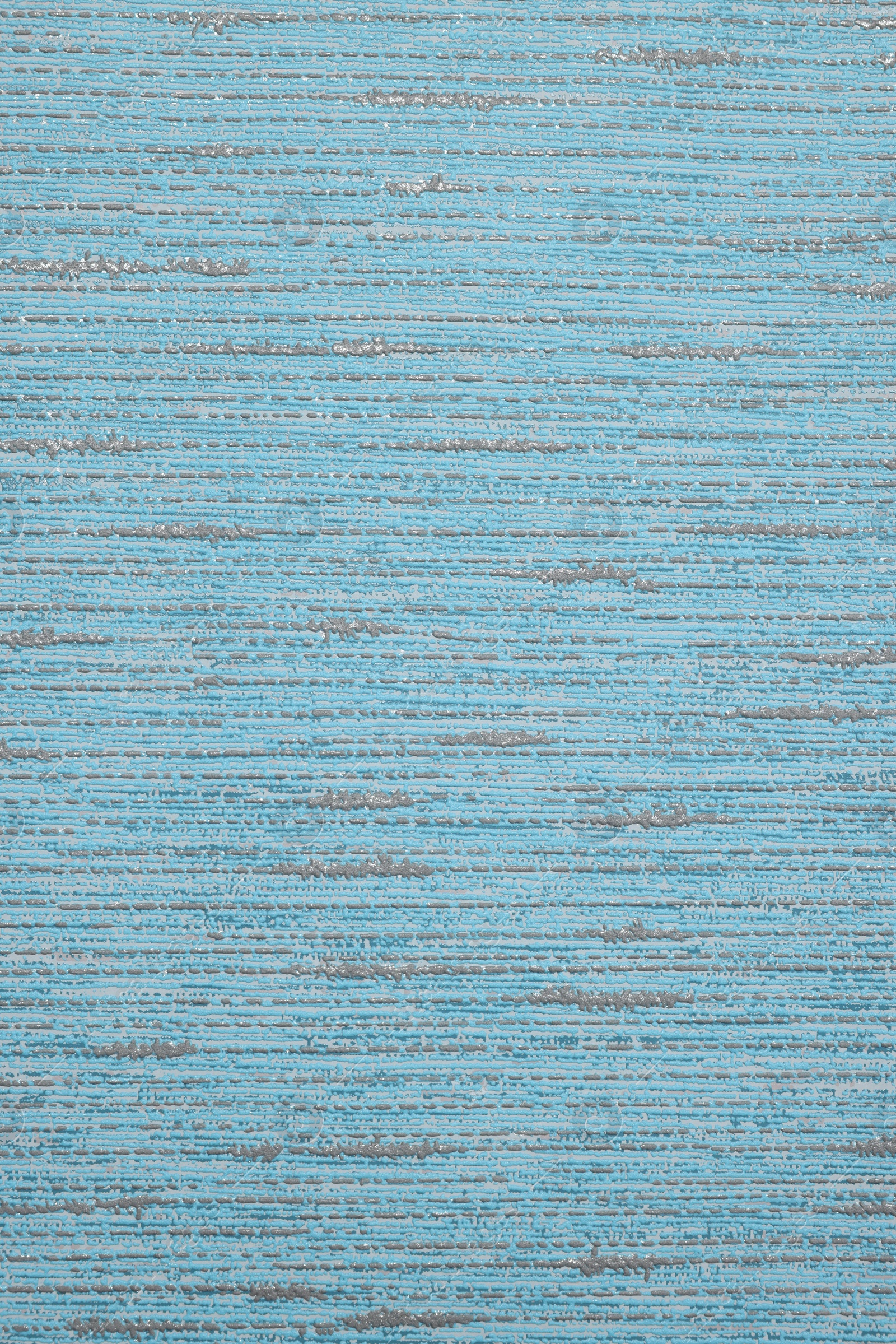 Photo of Stylish light blue wallpaper as background, closeup view