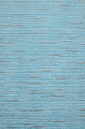 Stylish light blue wallpaper as background, closeup view