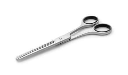 Photo of New thinning scissors isolated on white. Professional hairdresser tool