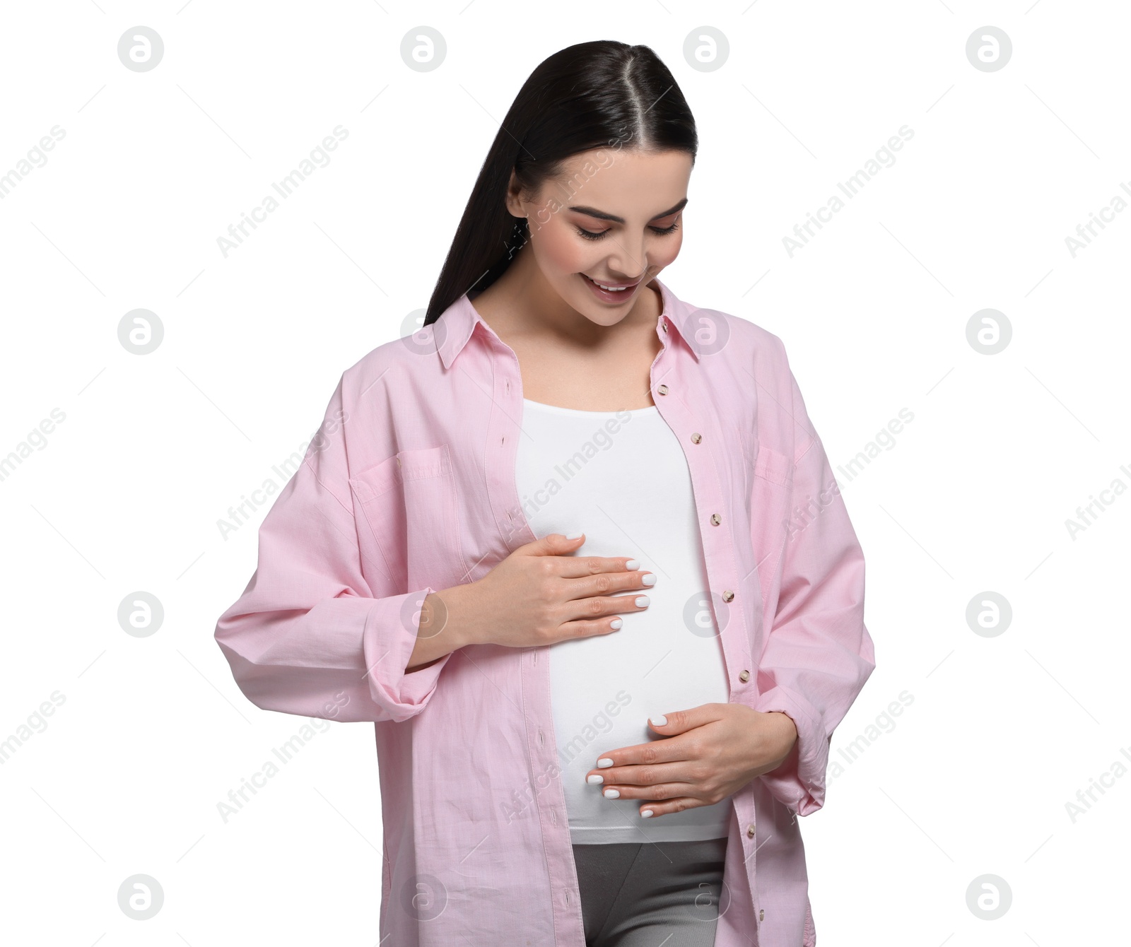 Photo of Beautiful happy pregnant woman isolated on white