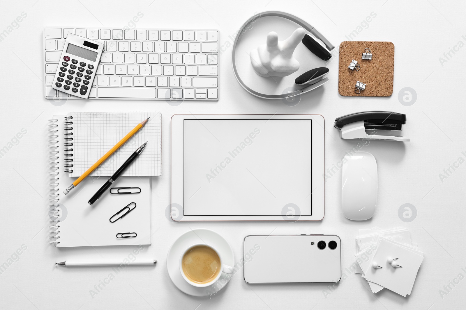 Photo of Flat lay composition with modern tablet on white background. Space for text