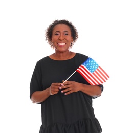 Portrait of happy African-American woman with USA flag on white background