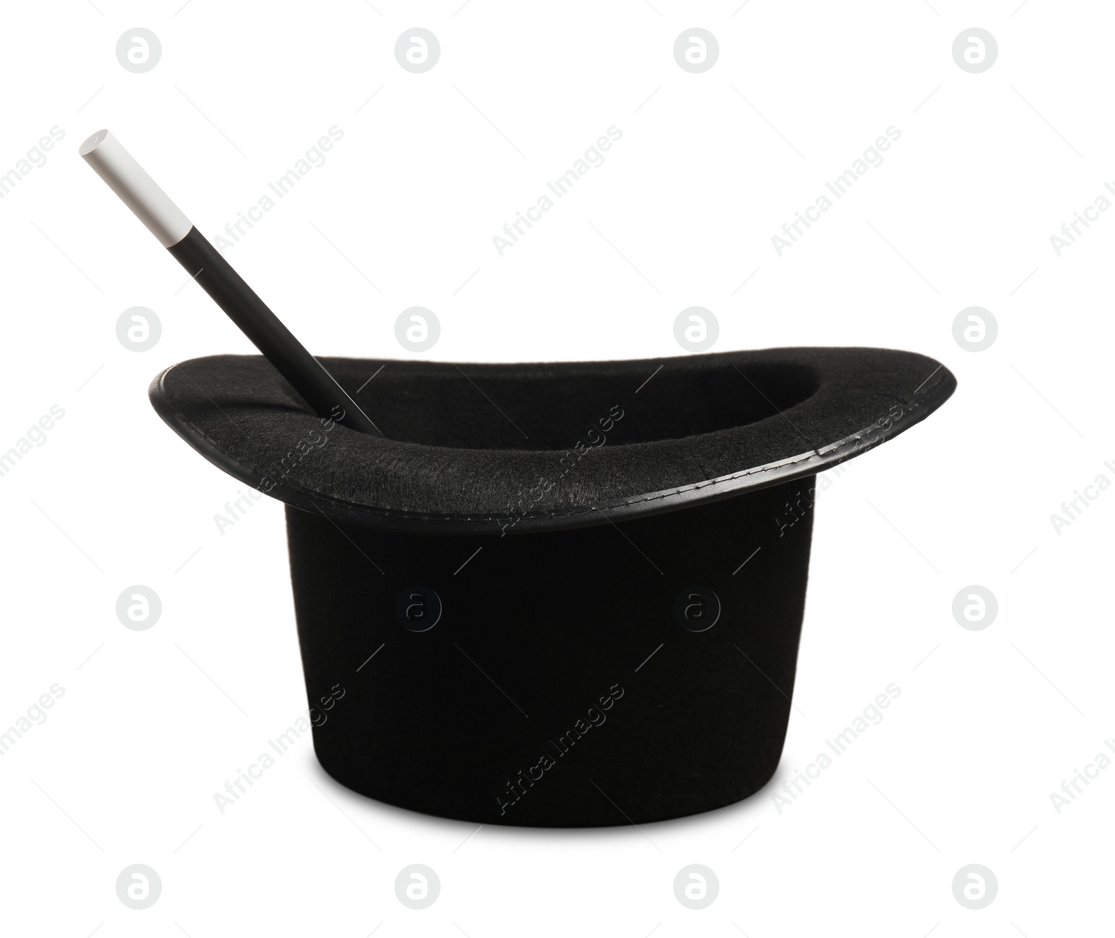 Photo of Magician's hat and wand on wooden table against white background