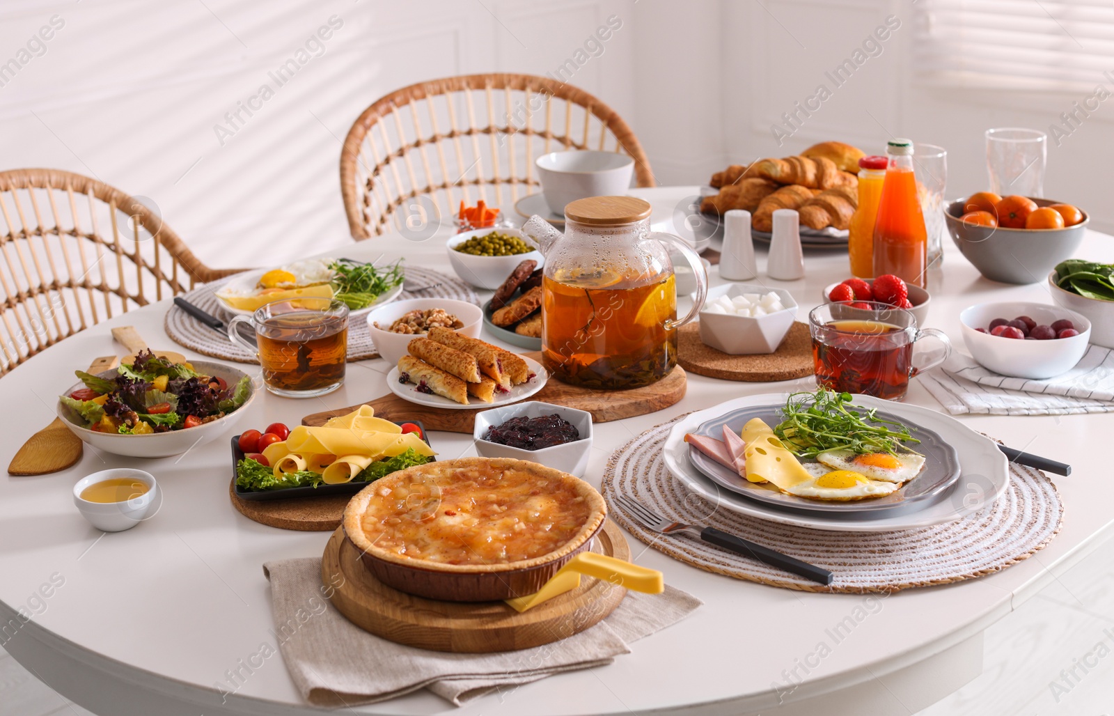 Photo of Many different dishes served on buffet table for brunch