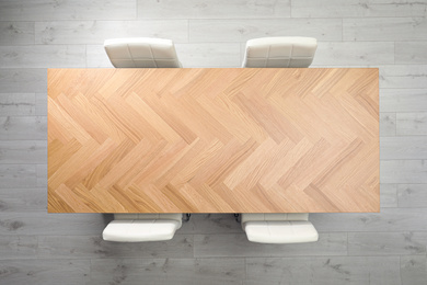 Photo of Modern office table with chairs, top view