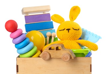 Photo of Many different children's toys in crate isolated on white