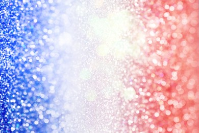 4th of July - USA Independence Day. Blurred view of glitters in colors of American national flag, bokeh effect 