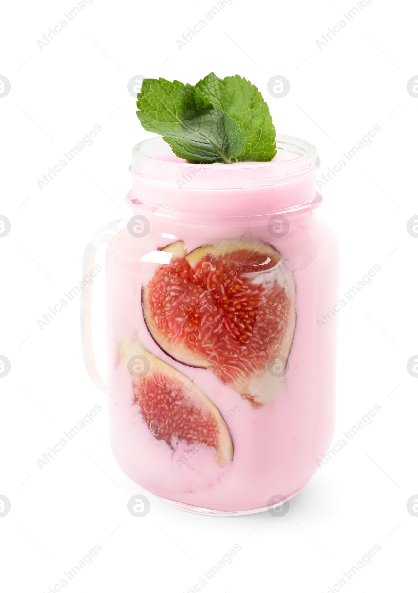 Photo of Delicious fig smoothie in mason jar on white background