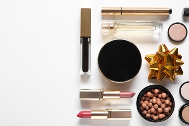 Set of luxury makeup products on white background, flat lay