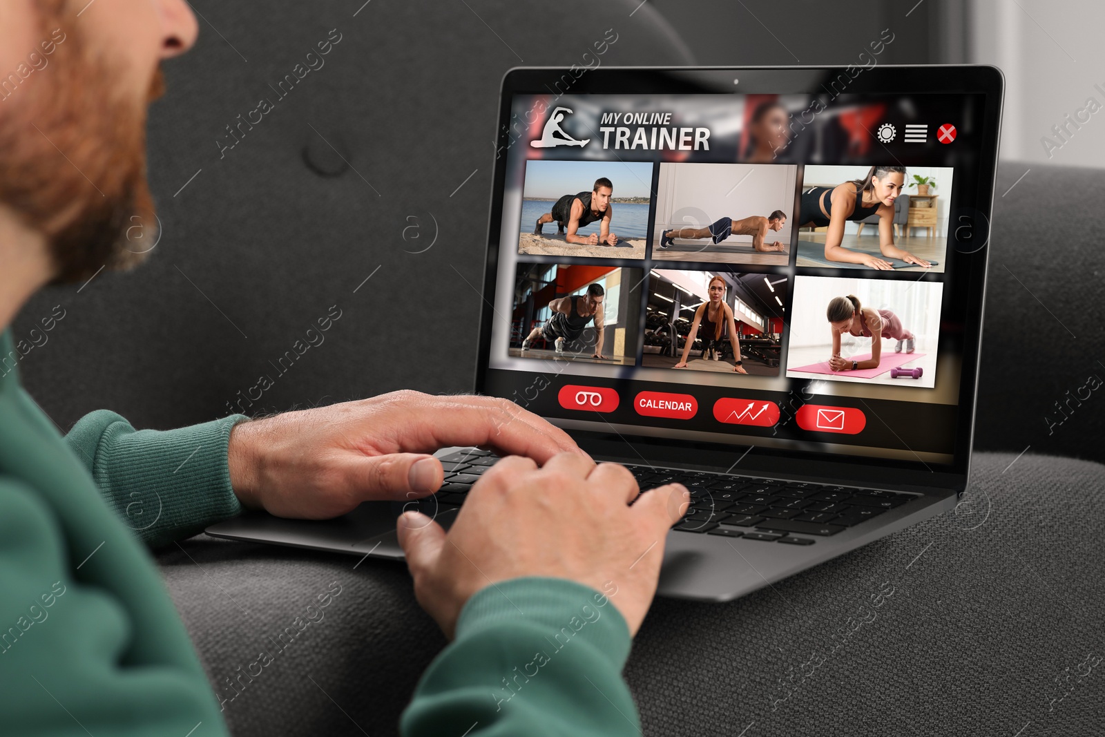 Image of Personal trainer online. Man viewing website via laptop at home, closeup