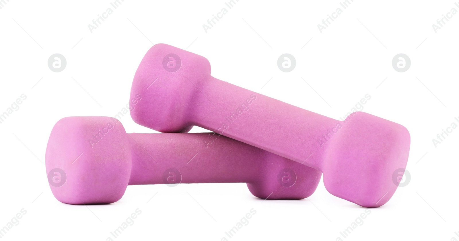 Photo of Pink dumbbells isolated on white. Sports equipment