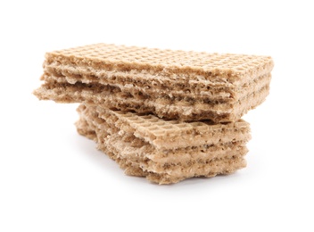 Photo of Delicious broken crispy wafer on white background. Sweet food