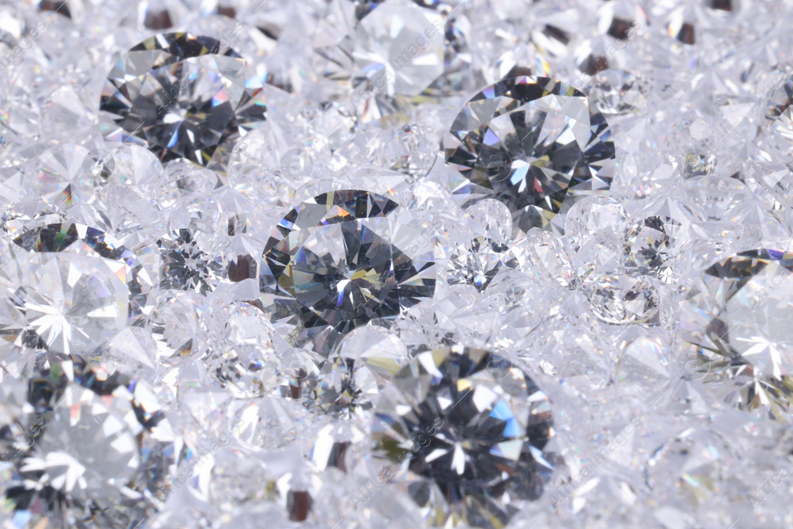 Photo of Many beautiful shiny diamonds as background, closeup