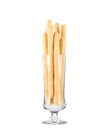 Delicious grissini in glass on white background