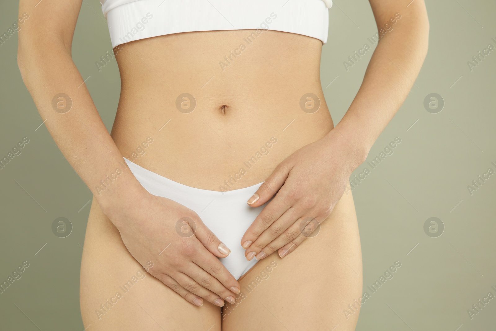 Photo of Gynecology. Woman in underwear on grey background, closeup