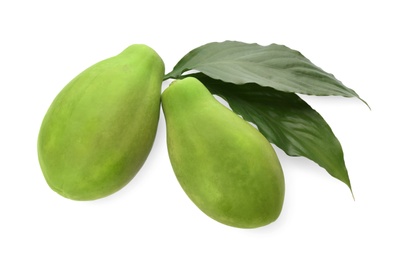 Fresh ripe papaya fruits with green leaves on white background, top view