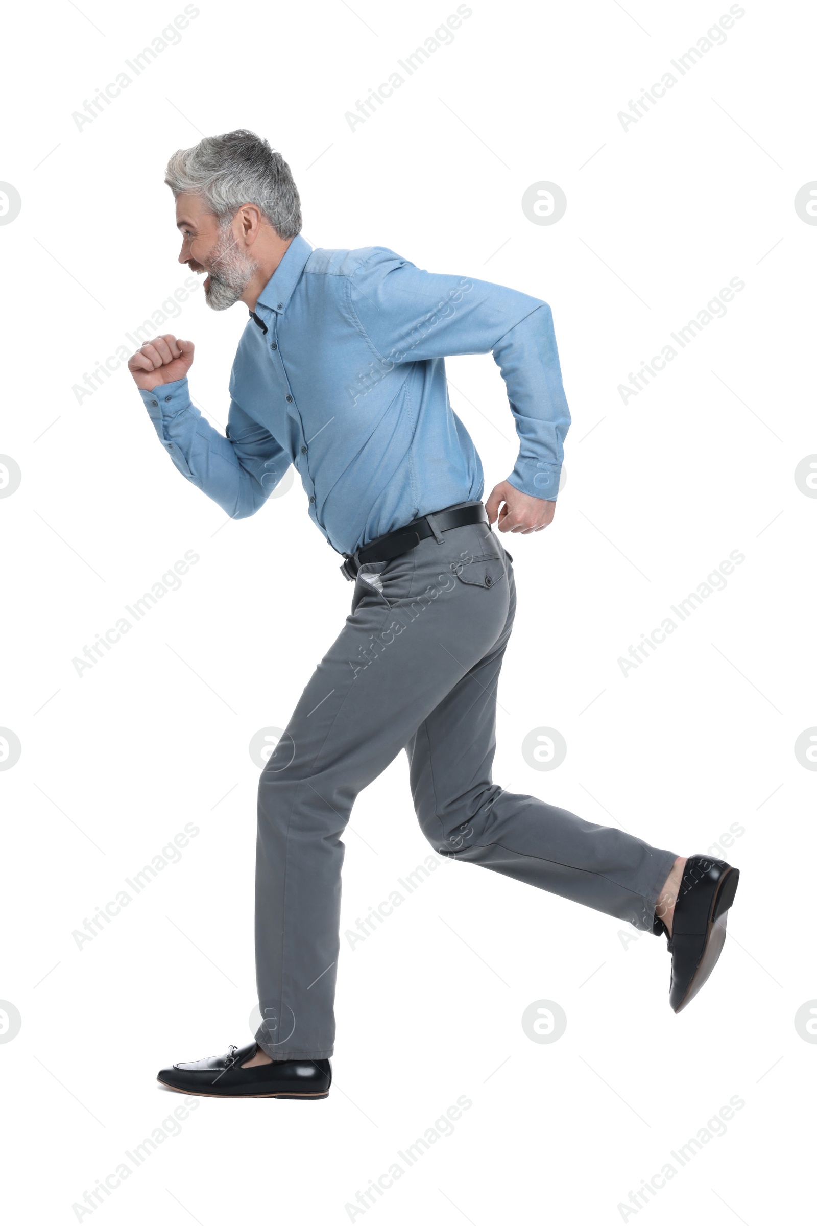 Photo of Mature businessman in stylish clothes posing on white background