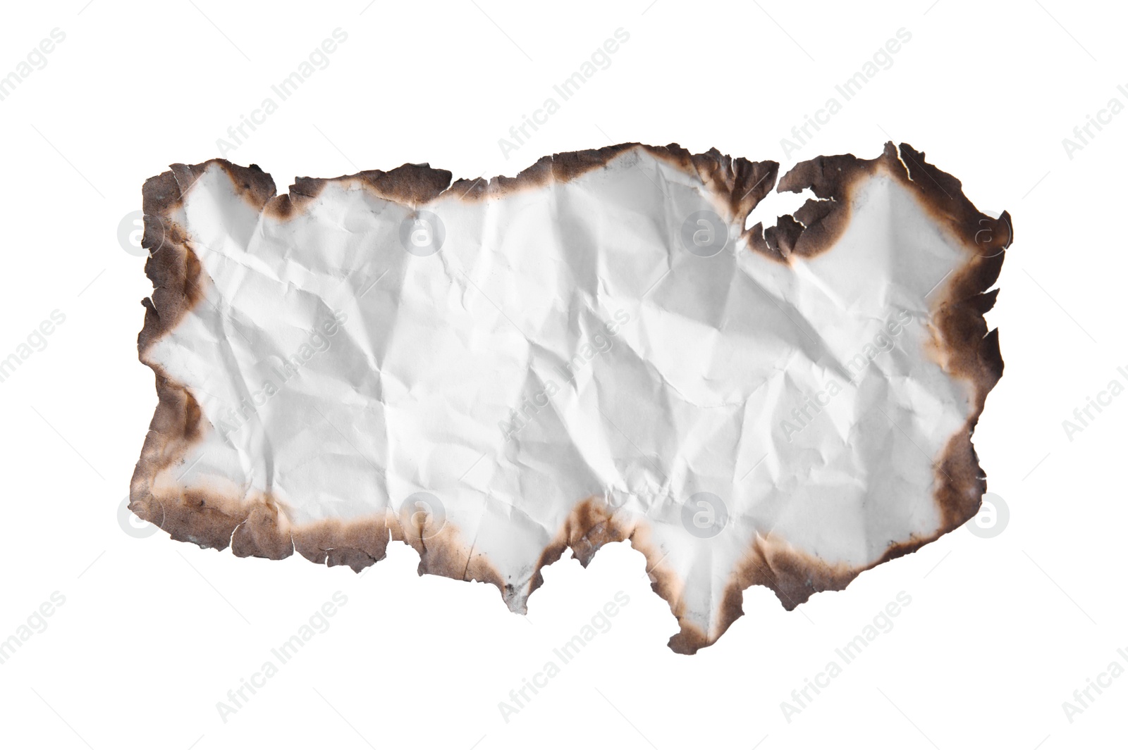 Photo of Piece of crumpled paper with dark burnt borders on white background, top view. Space for text