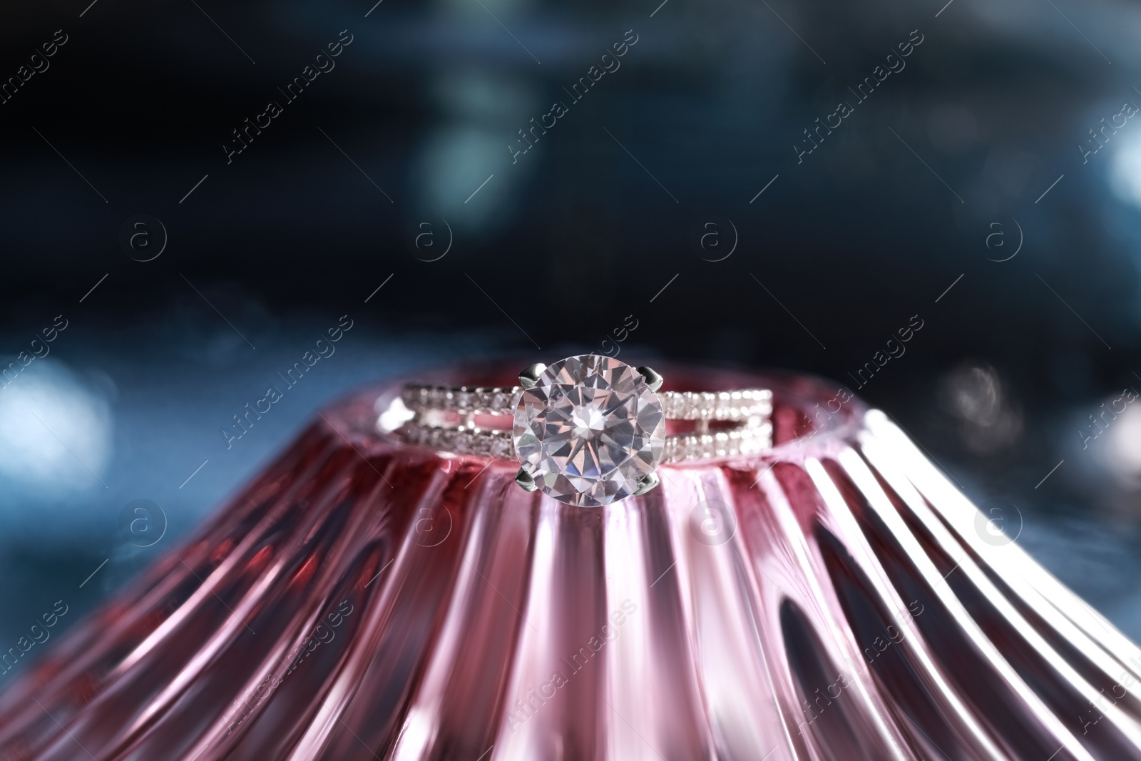 Photo of Elegant jewelry. Stylish presentation of luxury ring on podium, closeup