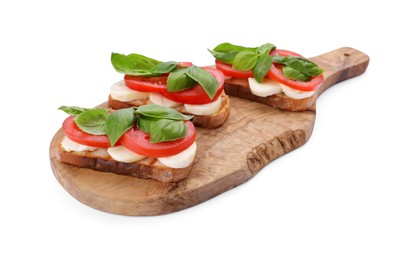 Photo of Delicious Caprese sandwiches with mozzarella, tomatoes and basil isolated on white