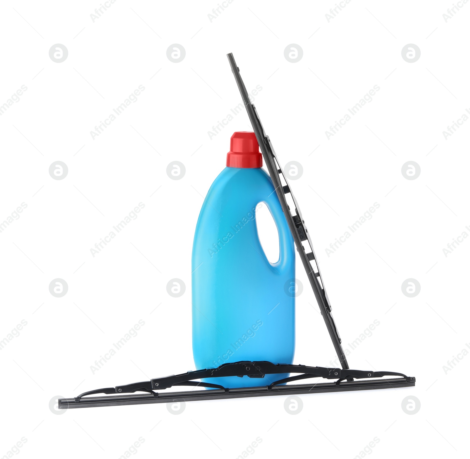 Photo of Bottle of windshield washer fluid and wipers on white background