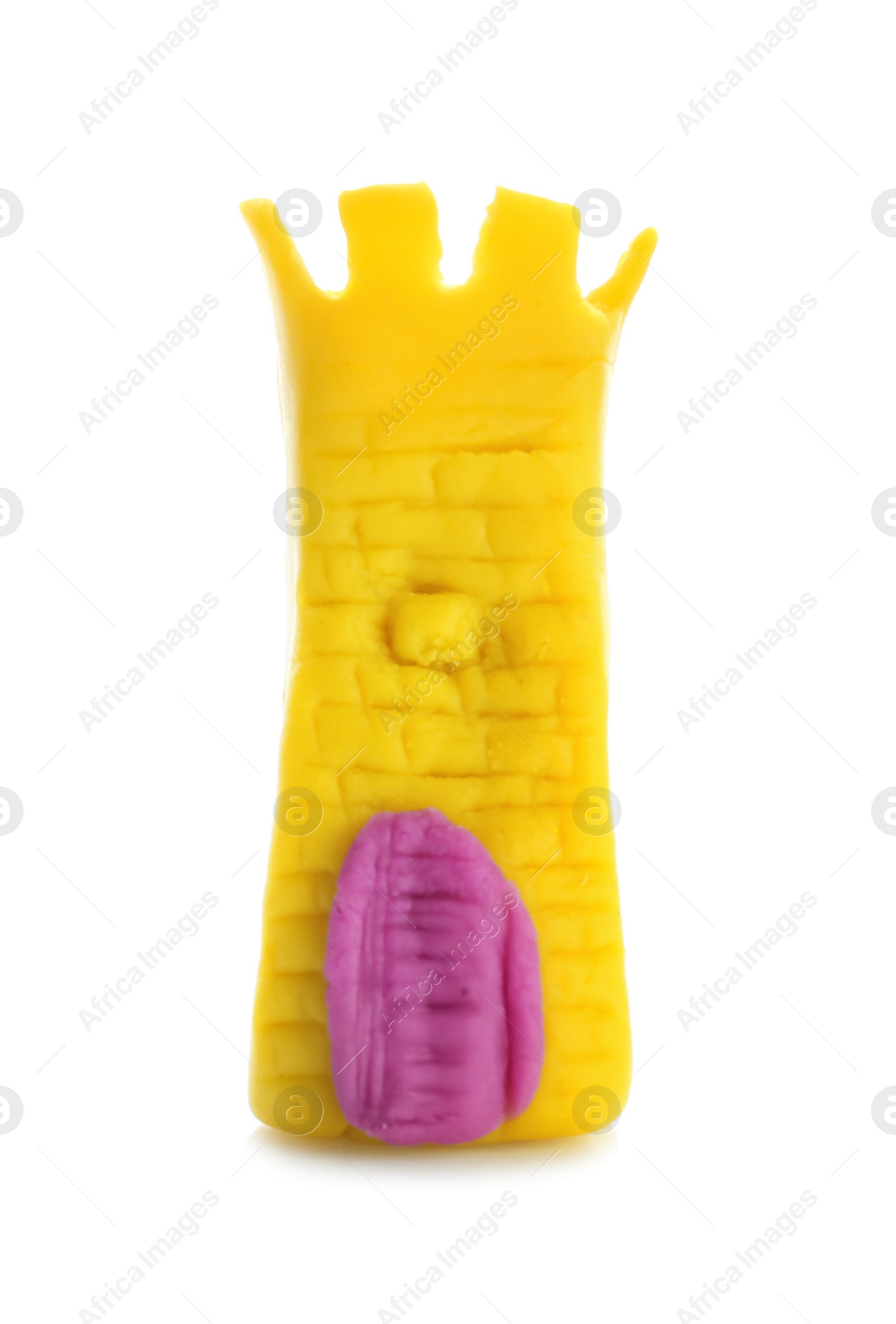 Photo of Medieval tower made from play dough on white background