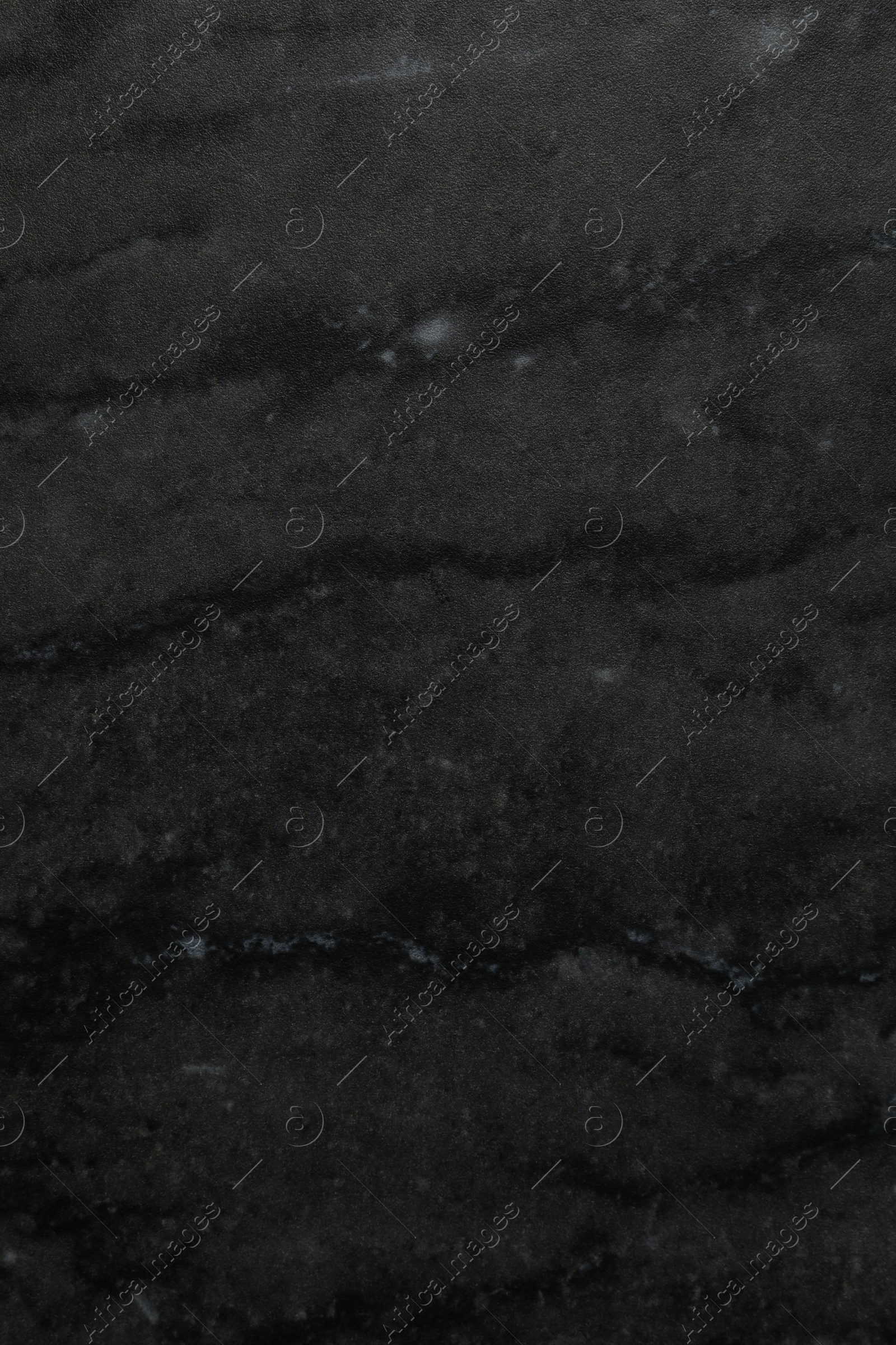 Photo of Black marble surface as background, closeup view