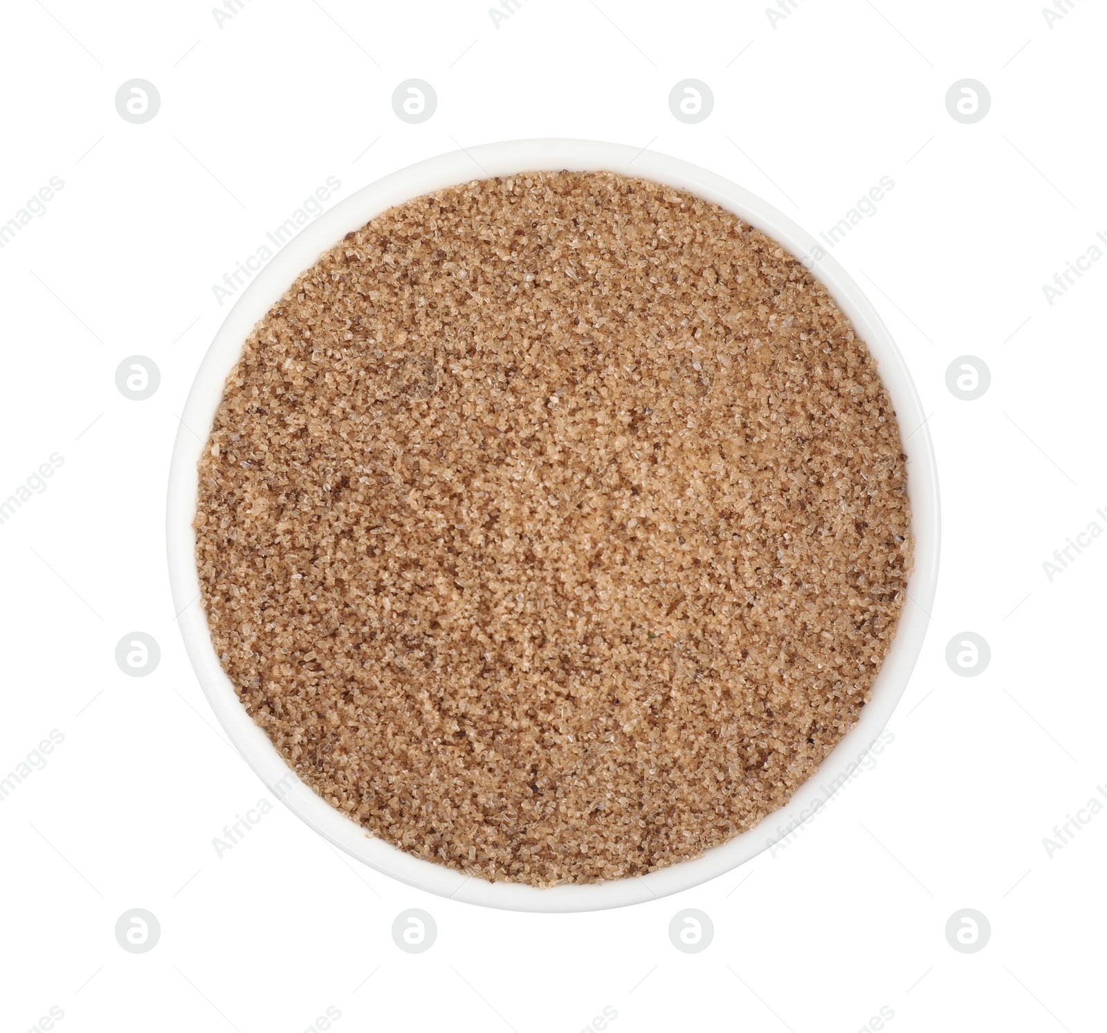 Photo of Brown salt in bowl isolated on white, top view