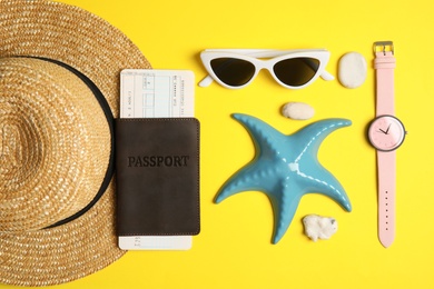 Flat lay composition with tourist items on color background. Travel agency