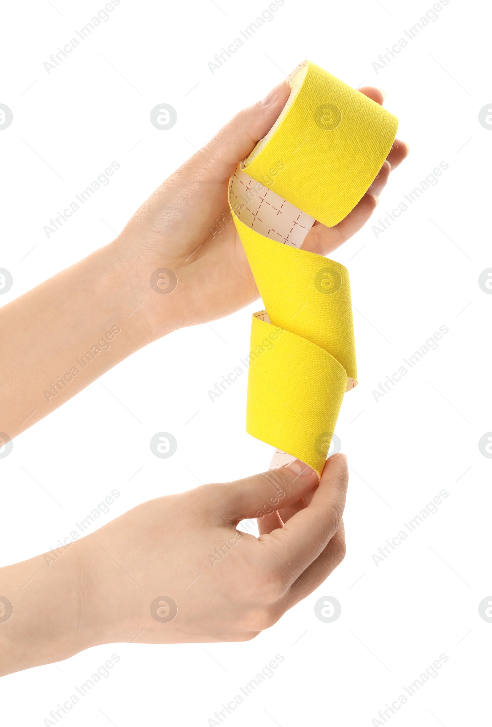 Photo of Woman with bright kinesio tape in roll on white background, closeup