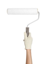 Woman holding paint roller brush on white background, closeup
