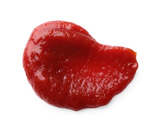 Photo of Smear of tasty ketchup isolated on white, top view