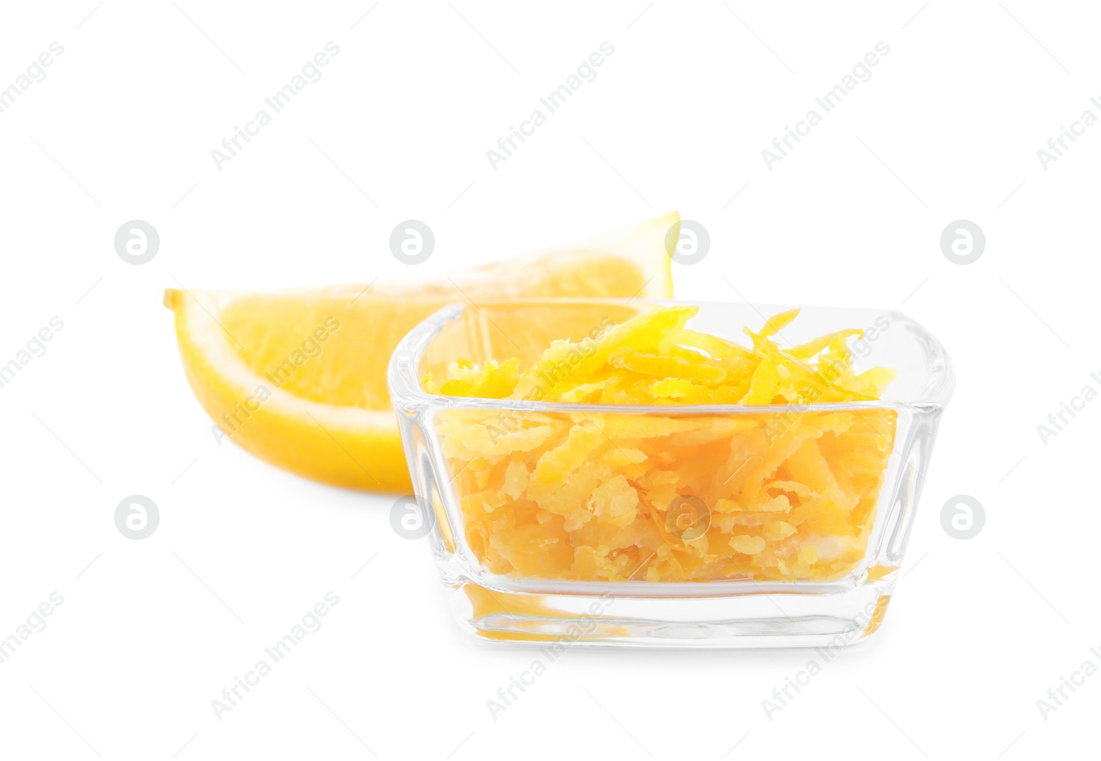 Photo of Grated lemon zest and fresh fruit on white background