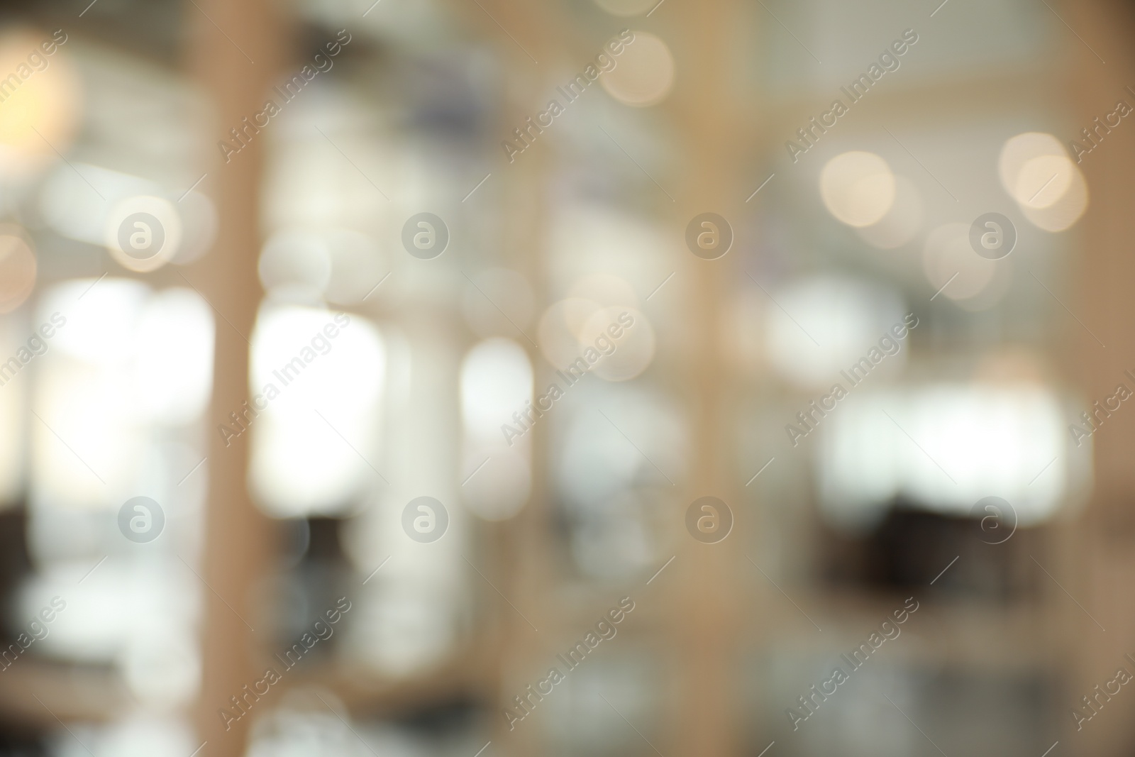 Photo of Blurred view of empty conference room and glass door in office