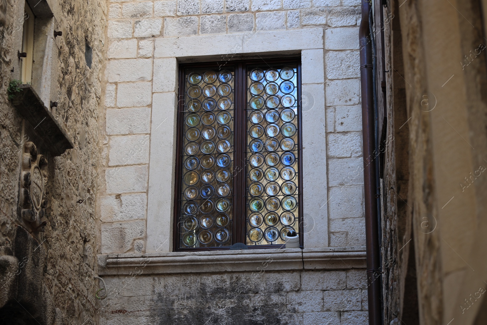 Photo of Old building with colorful stained glass window