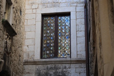 Old building with colorful stained glass window